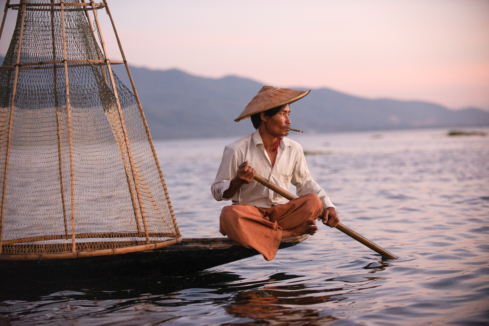 TP_1-59. Balancing Act.  Inlay Lake, Myanmar