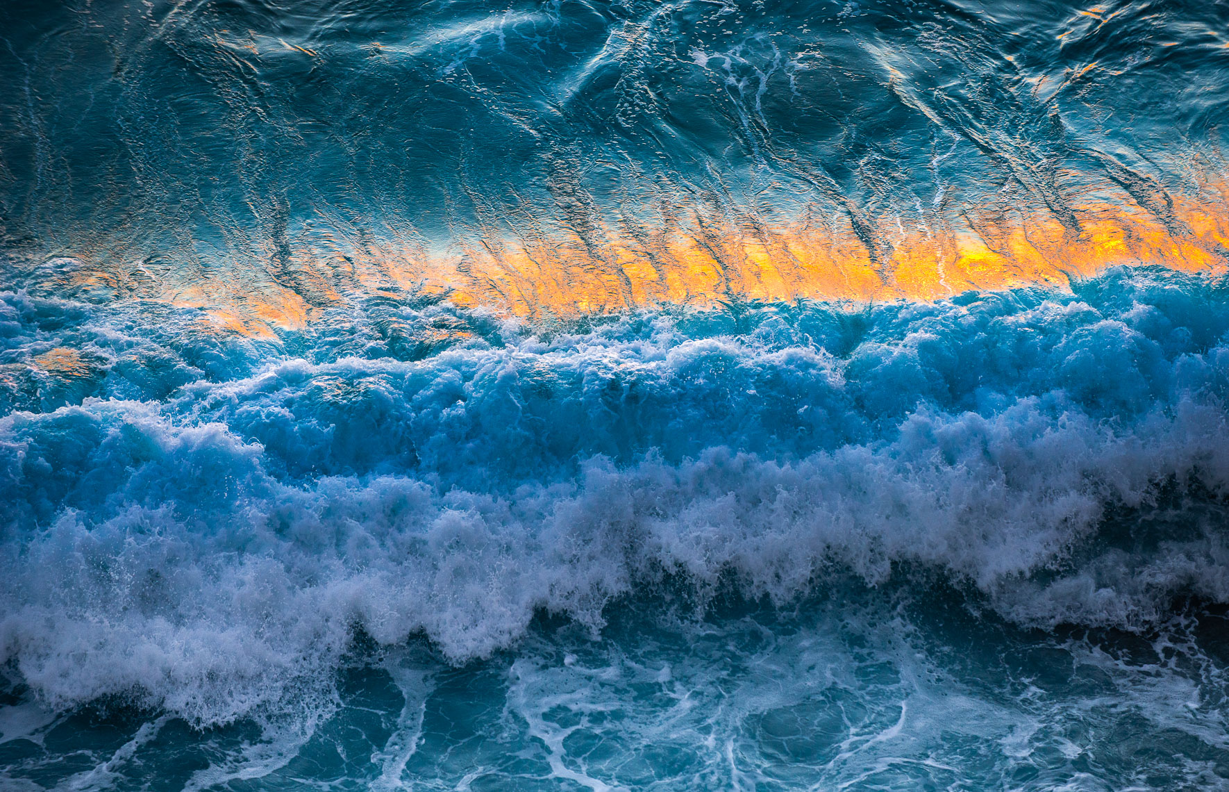 TP_1-84.   The most amazing waves I have photographed. The setting sun reflecting off the crest of the breaking wave creates this breathtaking image.